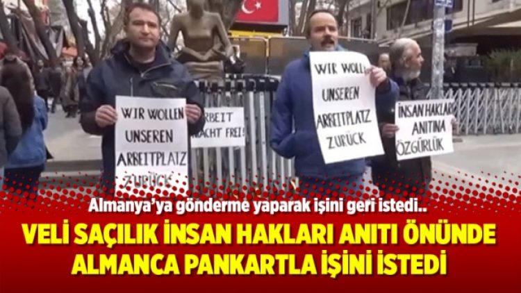 Veli Saçılık İnsan Hakları anıtı önünde Almanca pankartla işini istedi