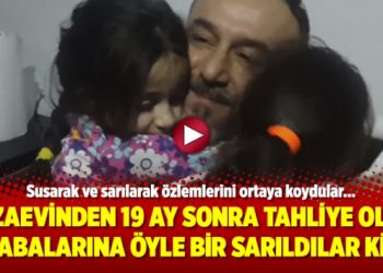 Cezaevinden 19 ay sonra tahliye olan babalarına öyle bir sarıldılar ki