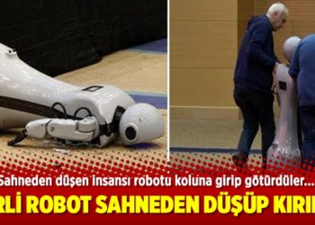 Sahneden düşen insansı robotu koluna girip götürdüler