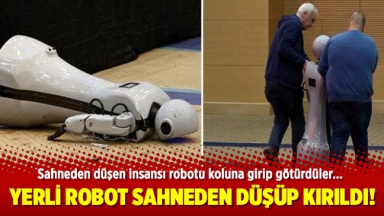 Sahneden düşen insansı robotu koluna girip götürdüler