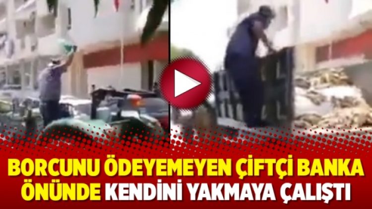 Borcunu ödeyemeyen çiftçi banka önünde kendini yakmaya çalıştı