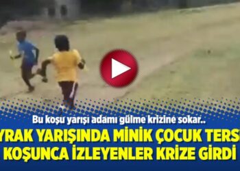 Bayrak yarışında minik çocuk tersine koşunca izleyenler krize girdi