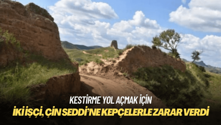 İki işçi, kestirme yol açmak için Çin Seddi’ne kepçelerle zarar verdi