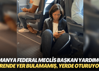 Almanya Federal Meclis Başkan Yardımcısı trende Yer bulamamış, yerde oturuyor